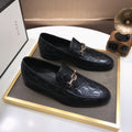 GUCCI Black Embossed Horsebit Loafers — hero