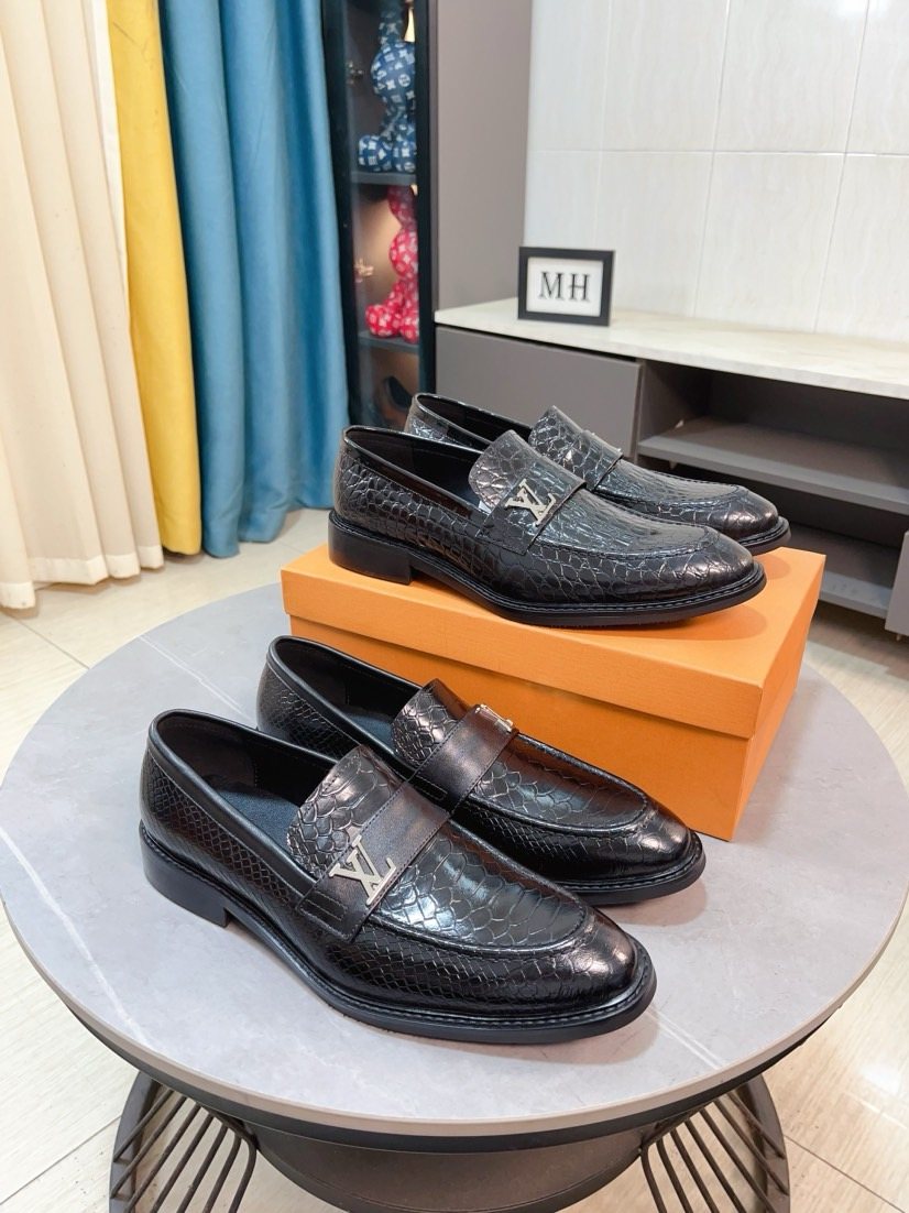 Louis Vuitton Black Embossed Loafers — front
