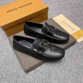 Louis Vuitton Black Metal-Accent Loafers — hero