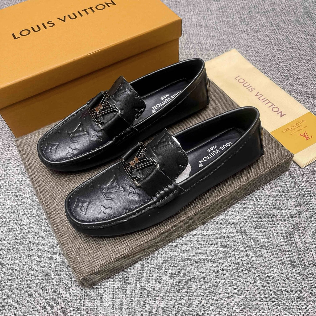 Louis Vuitton Black Metal-Accent Loafers — front