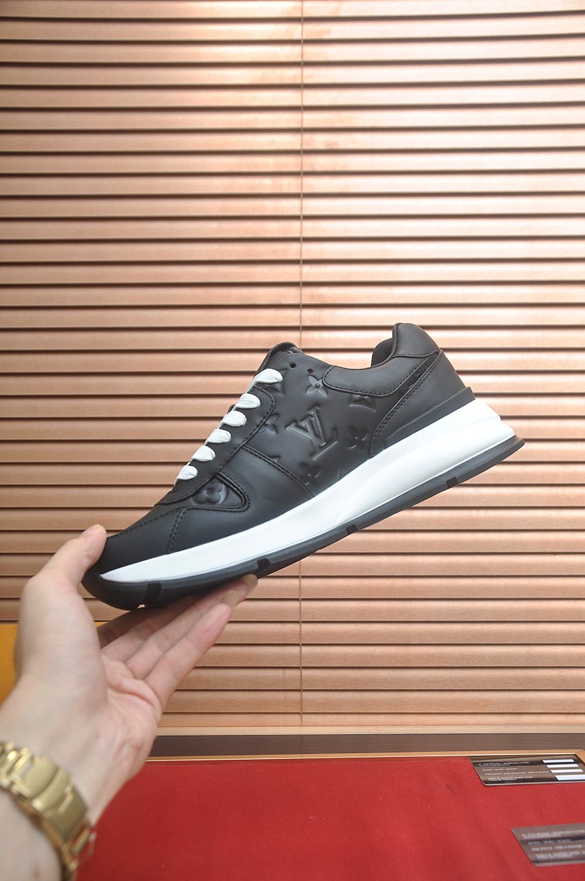 Louis Vuitton Black Embossed Low-Top Sneakers — side