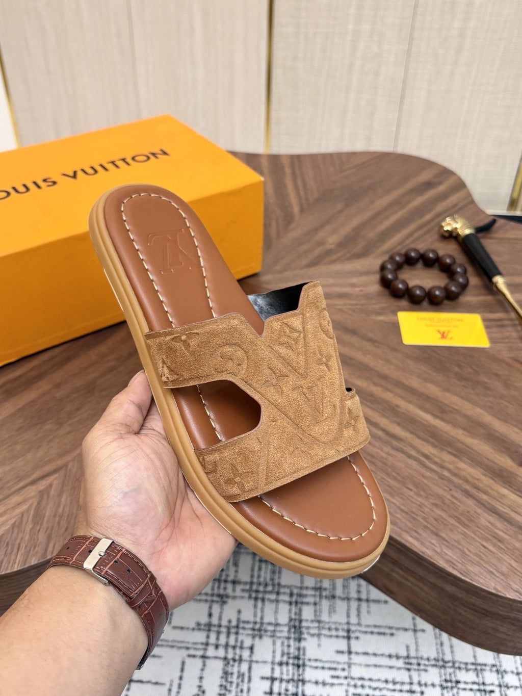 Louis Vuitton Tan Monogram Slide Sandals — model