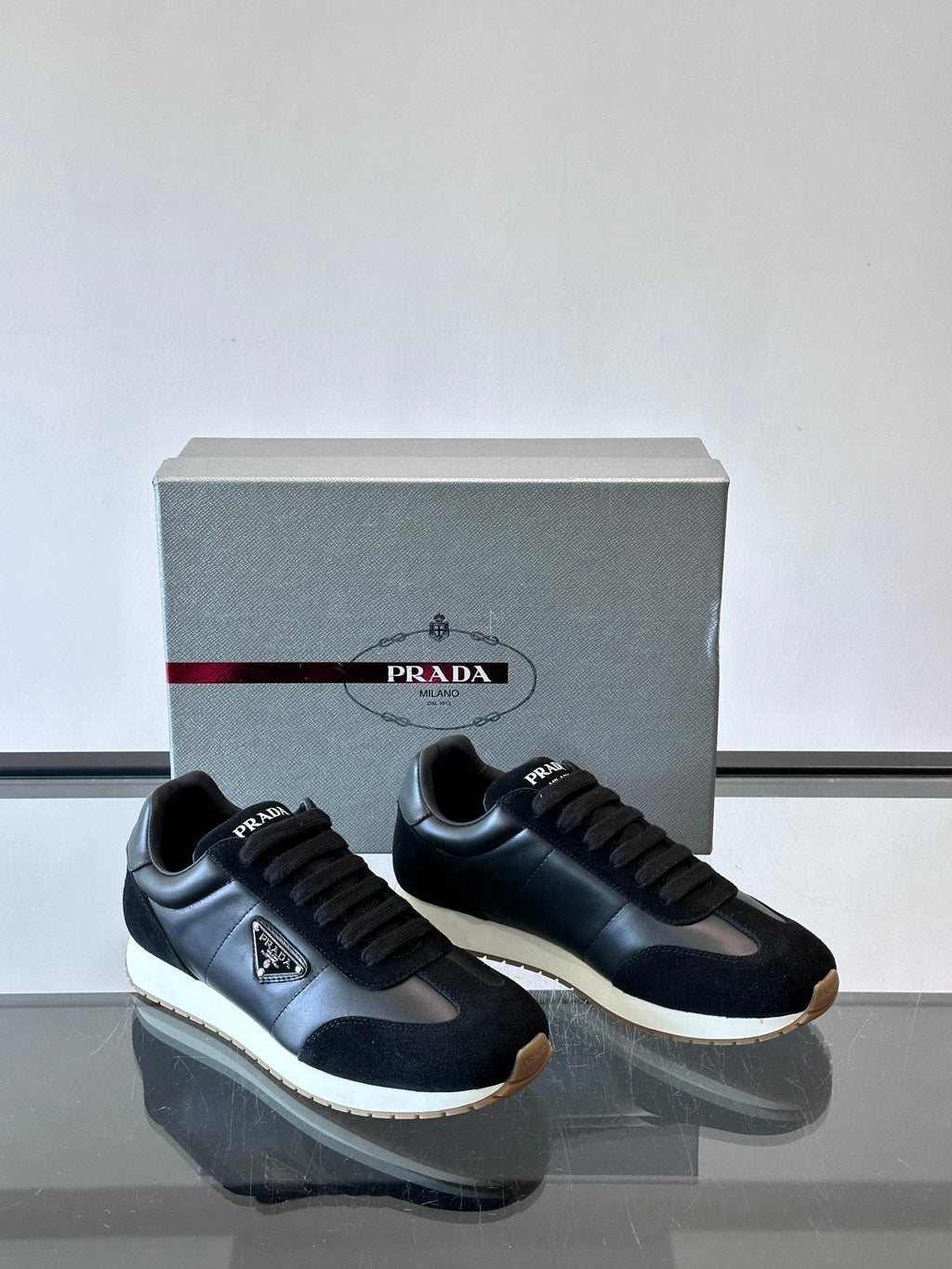 Prada Black Triangle Detail Sneakers — front