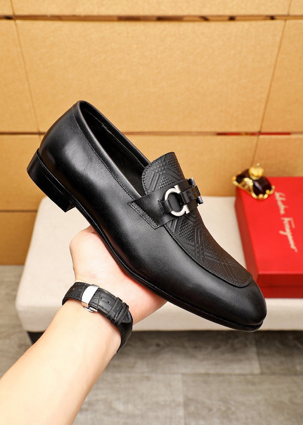 Ferragamo Black Embossed Buckle Loafers — model