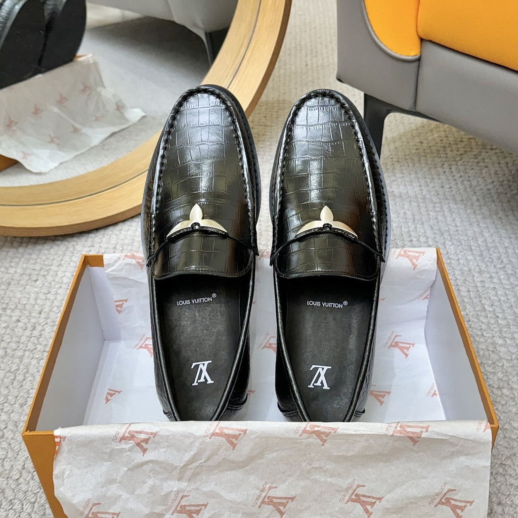 Louis Vuitton Black Embossed Leather Loafers — front