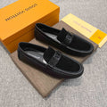 Louis Vuitton Black Textured Strap Loafers — hero