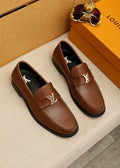 Louis Vuitton Brown Buckle Loafers — hero