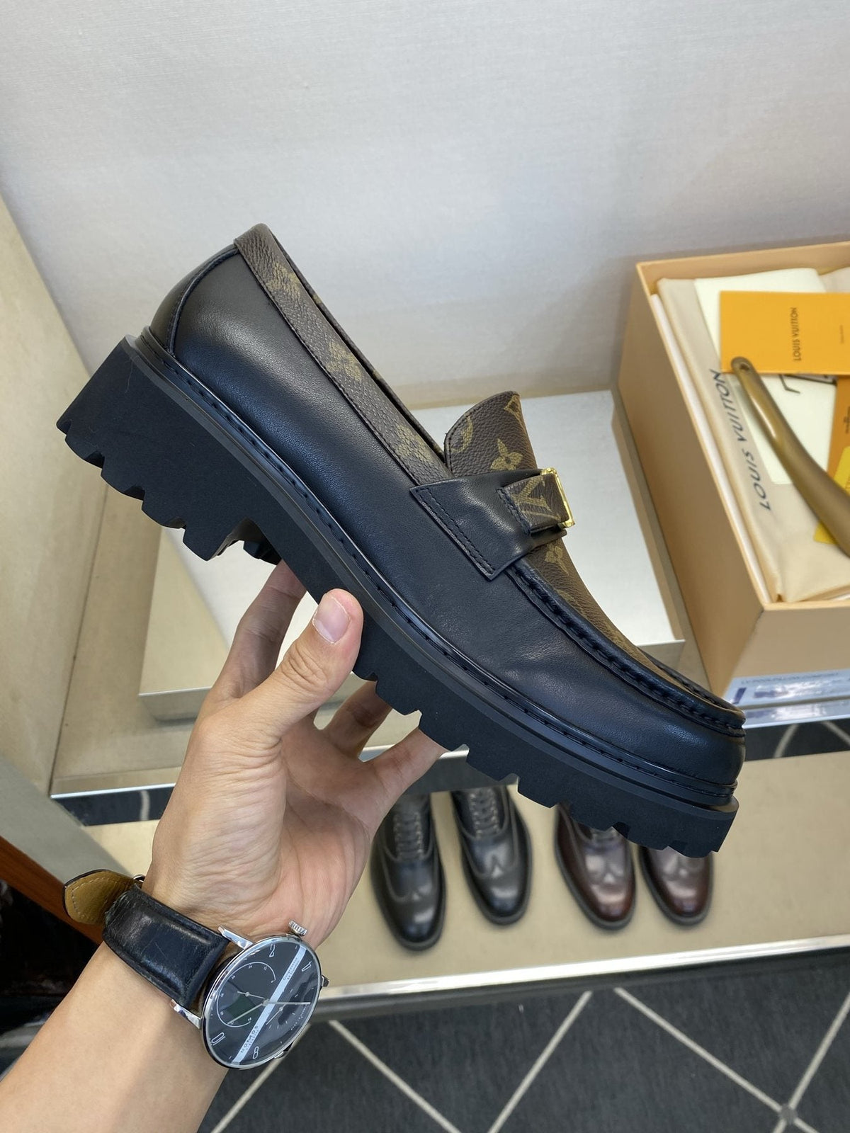 Louis Vuitton Brown Monogram Hardware Loafers — model