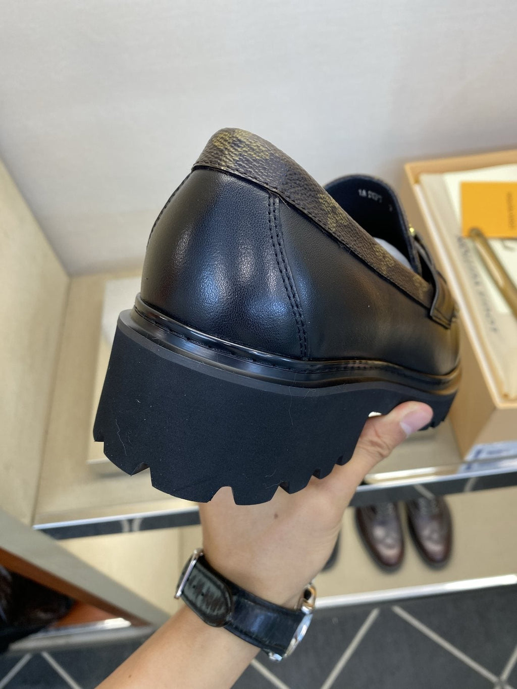 Louis Vuitton Brown Monogram Hardware Loafers — model