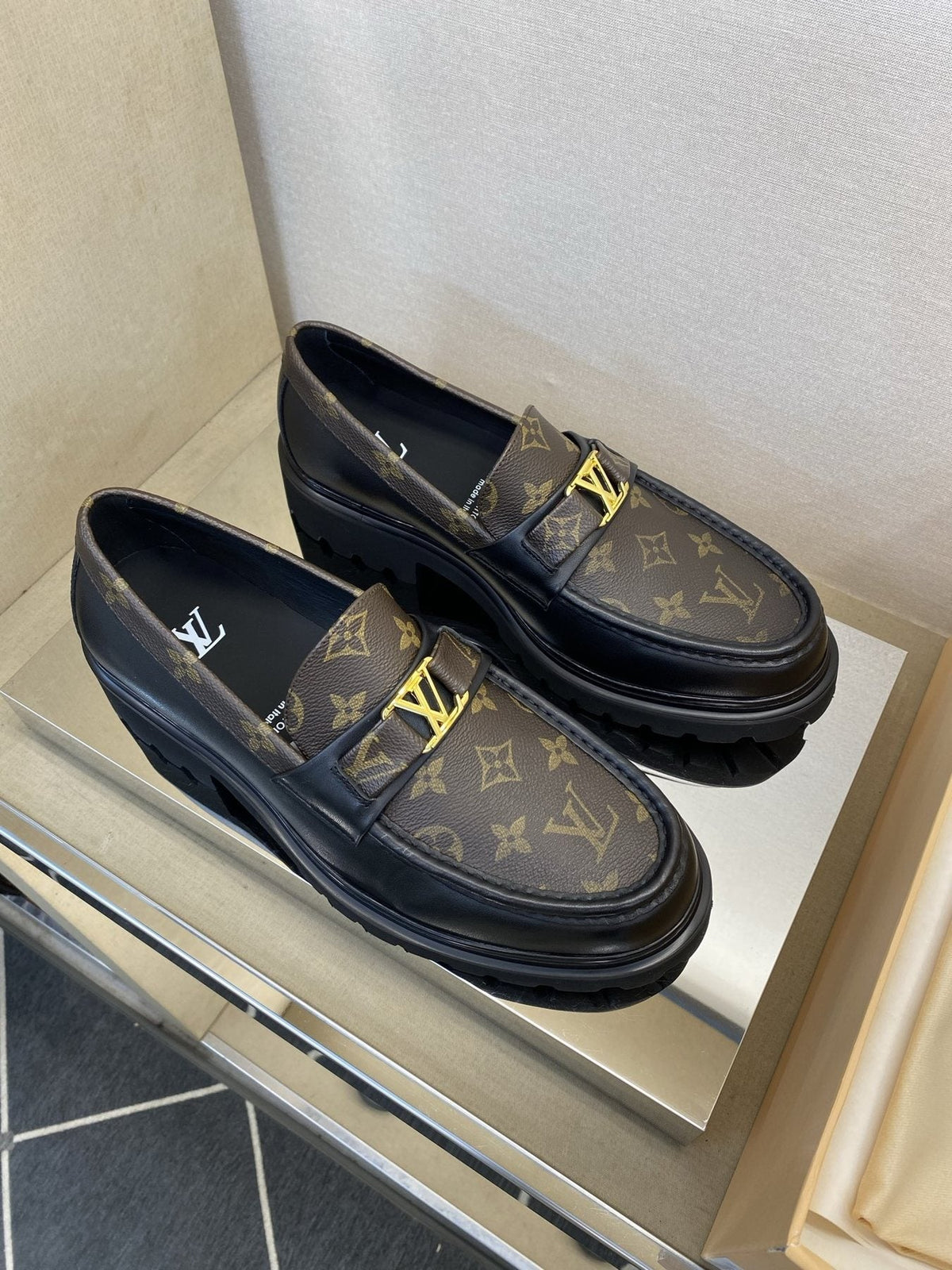 Louis Vuitton Brown Monogram Hardware Loafers — front