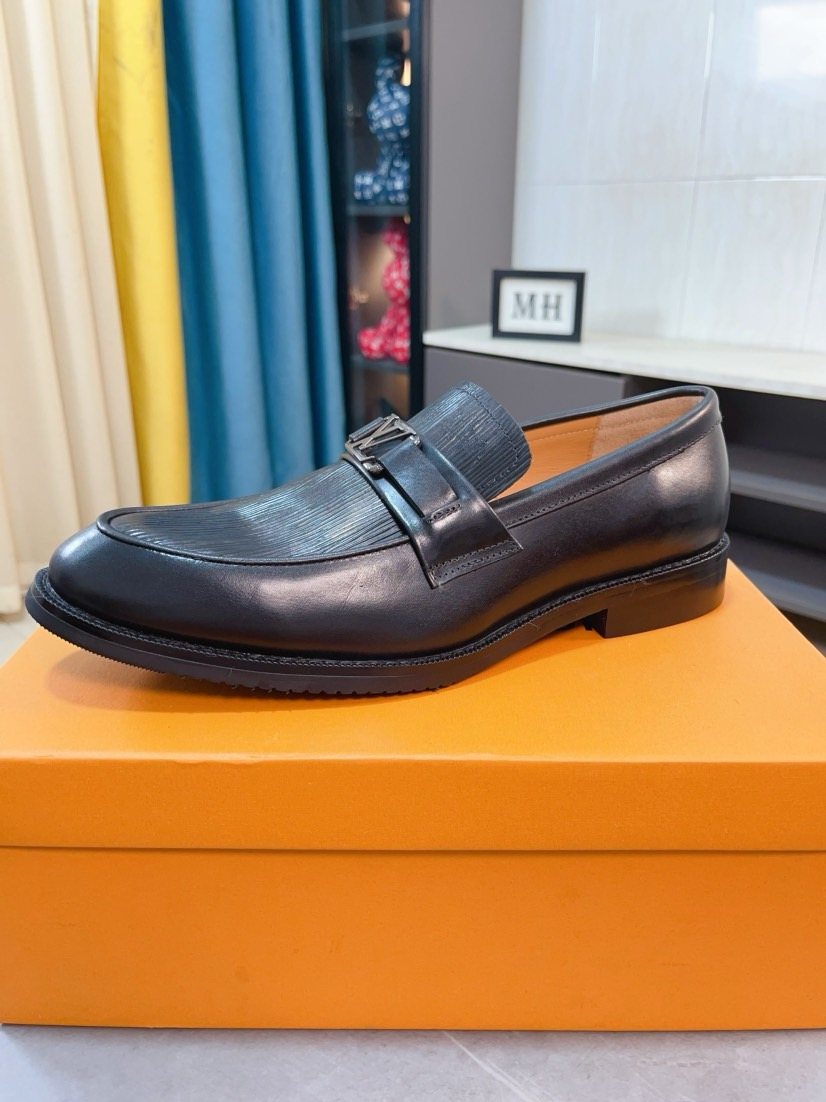 Louis Vuitton Black Textured Buckle Loafers — front