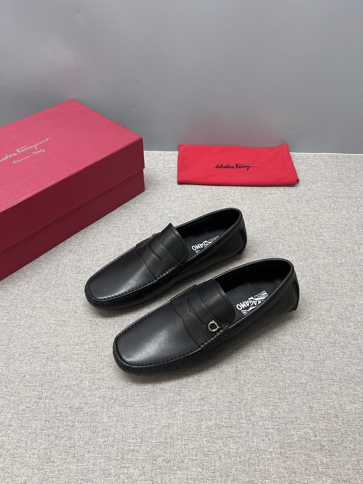 Ferragamo Black Buckle Loafers — front