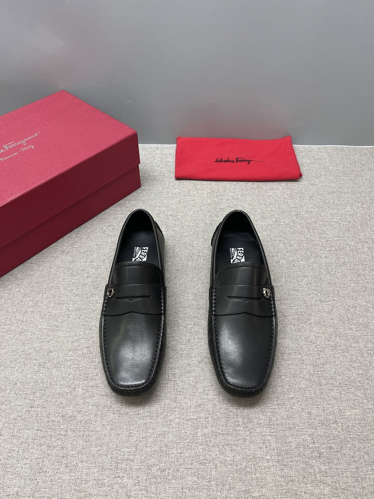 Ferragamo Black Buckle Loafers — front