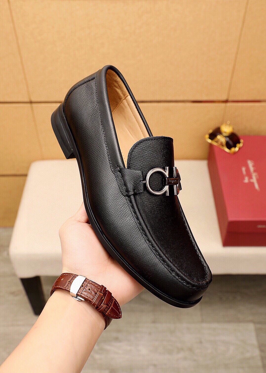 Ferragamo Black Metal-Bit Loafers — model