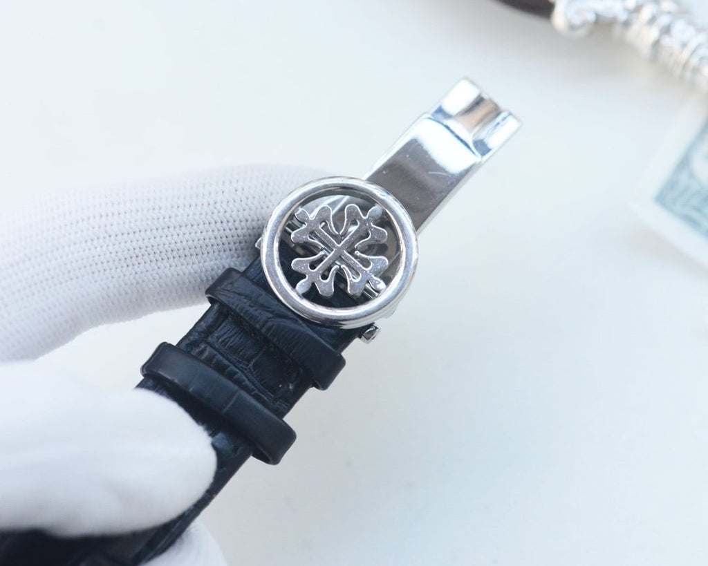 Patek Philippe Silver Black Leather Strap Watch — detail