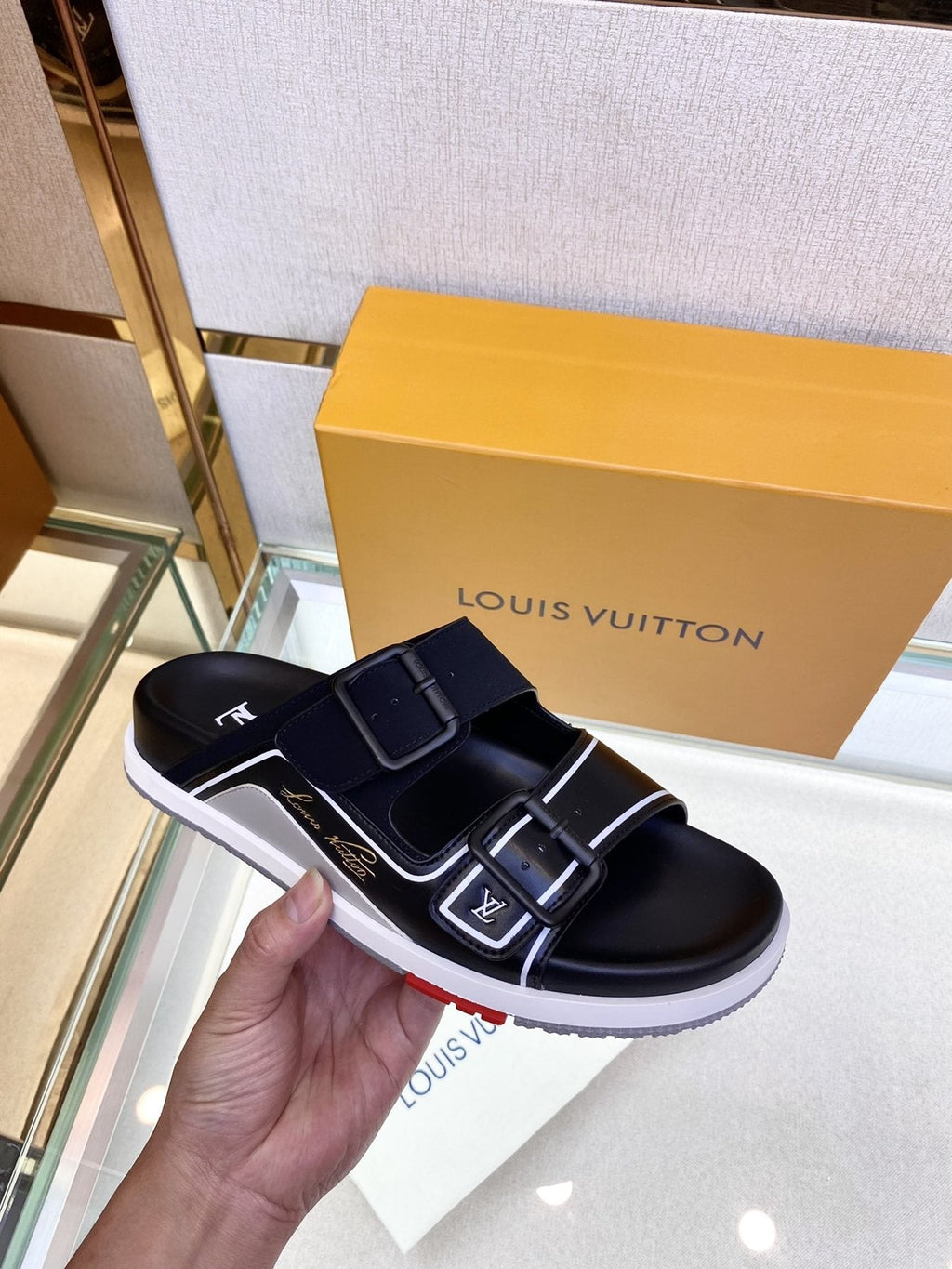 Louis Vuitton Black Two-Strap Slide Sandals — model