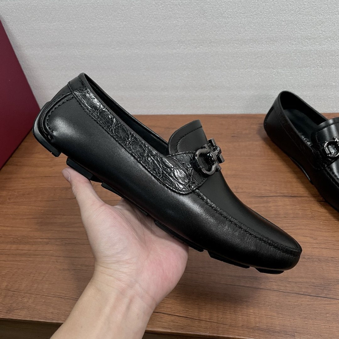 FERRAGAMO Black Horsebit Driving Loafers — model