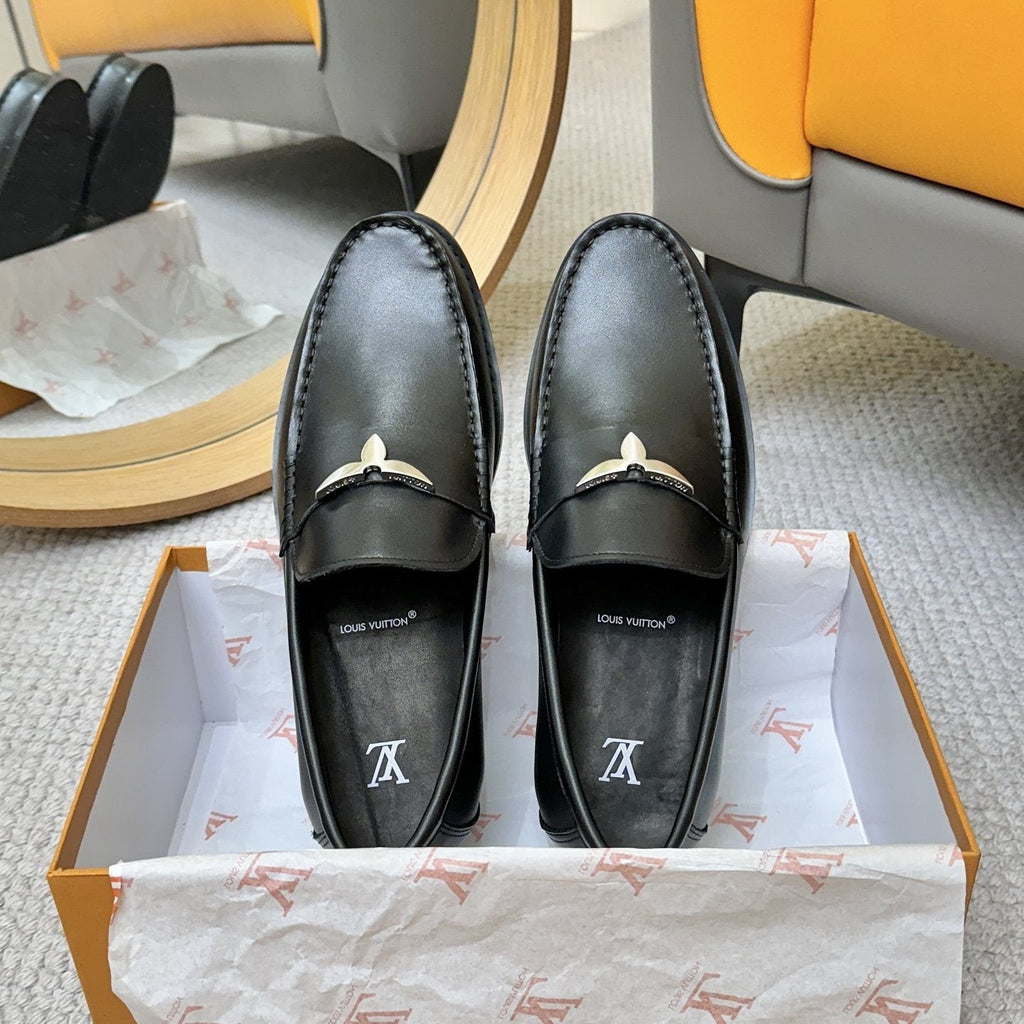 Louis Vuitton Black Metal-Accent Loafers — front