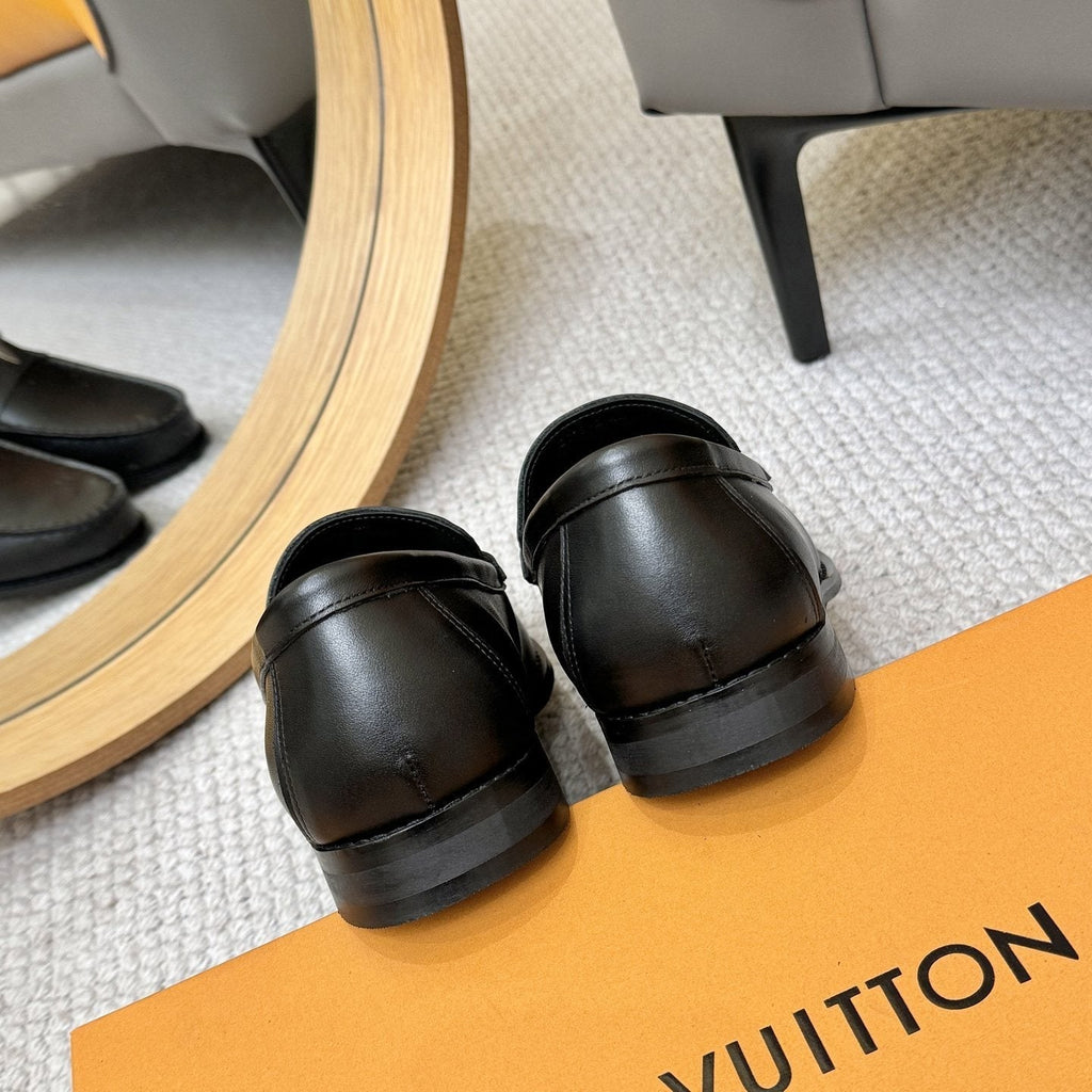 Louis Vuitton Black Metal-Accent Loafers — back