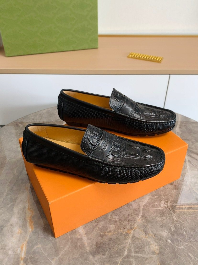 Louis Vuitton Black Textured Leather Loafers — front