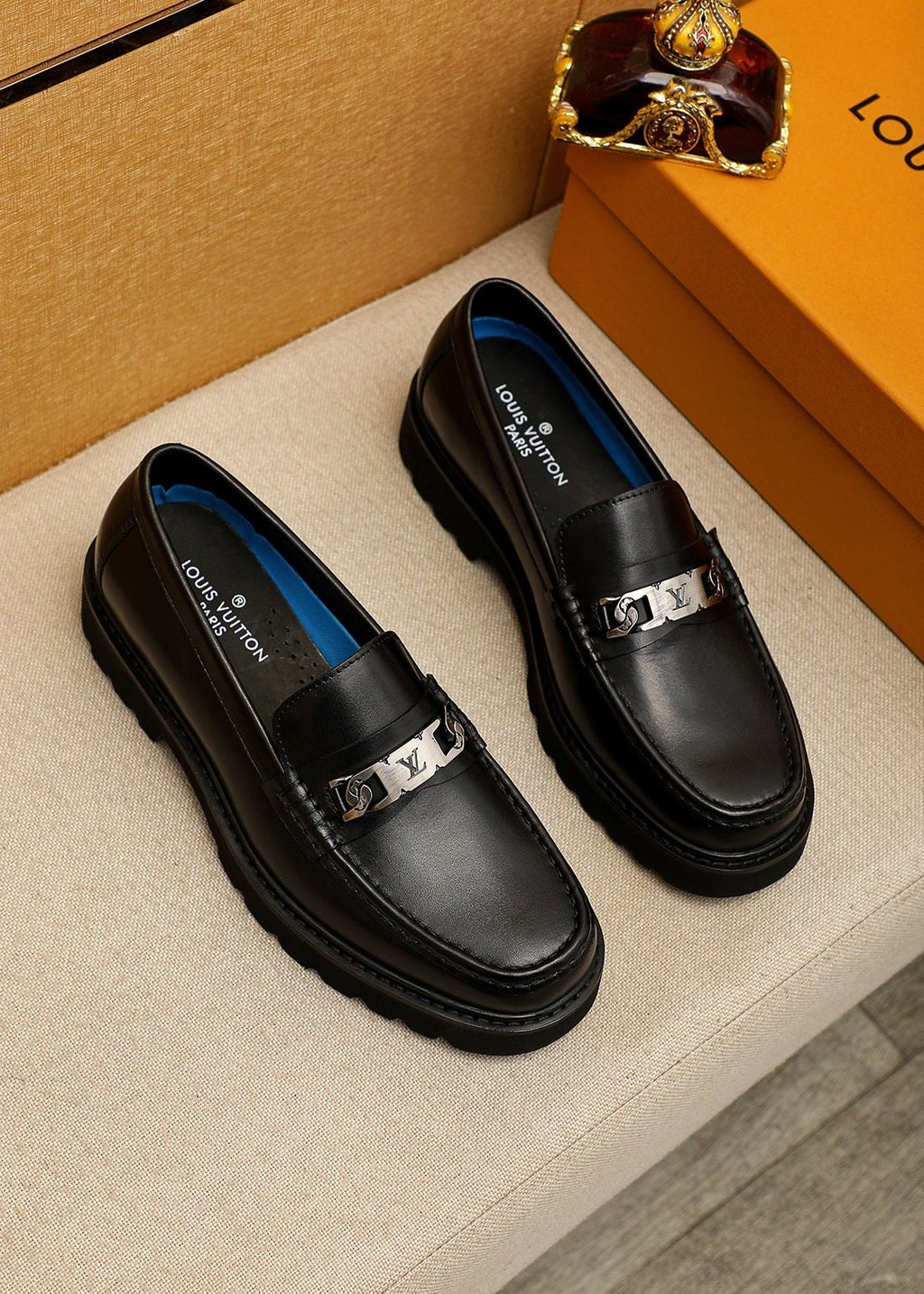 Louis Vuitton Black Metal-Bit Loafers — hero