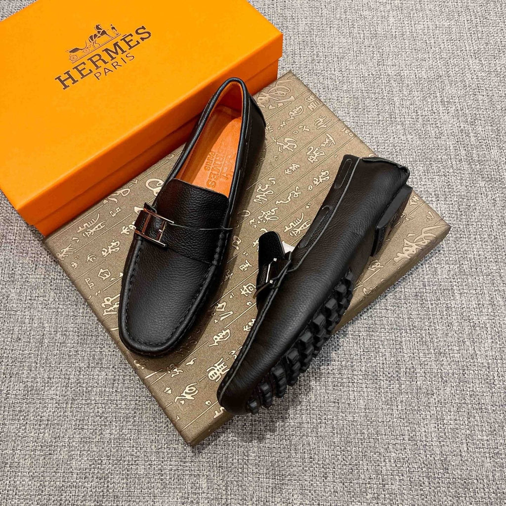 Hermès Black Bar Loafers — side