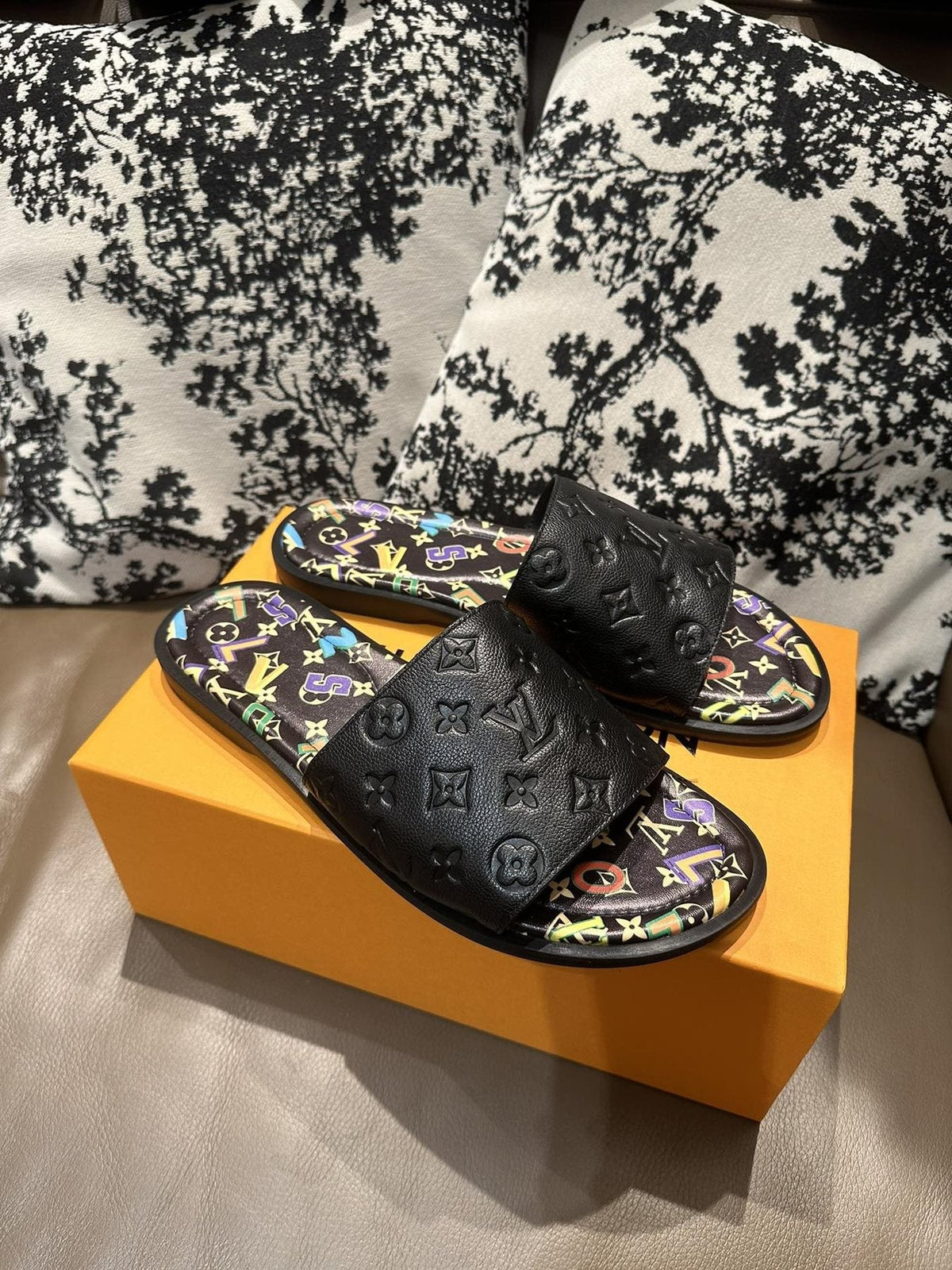 Louis Vuitton Black Embossed Slide Sandals — front