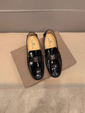 Louis Vuitton Black Embossed Loafers — hero