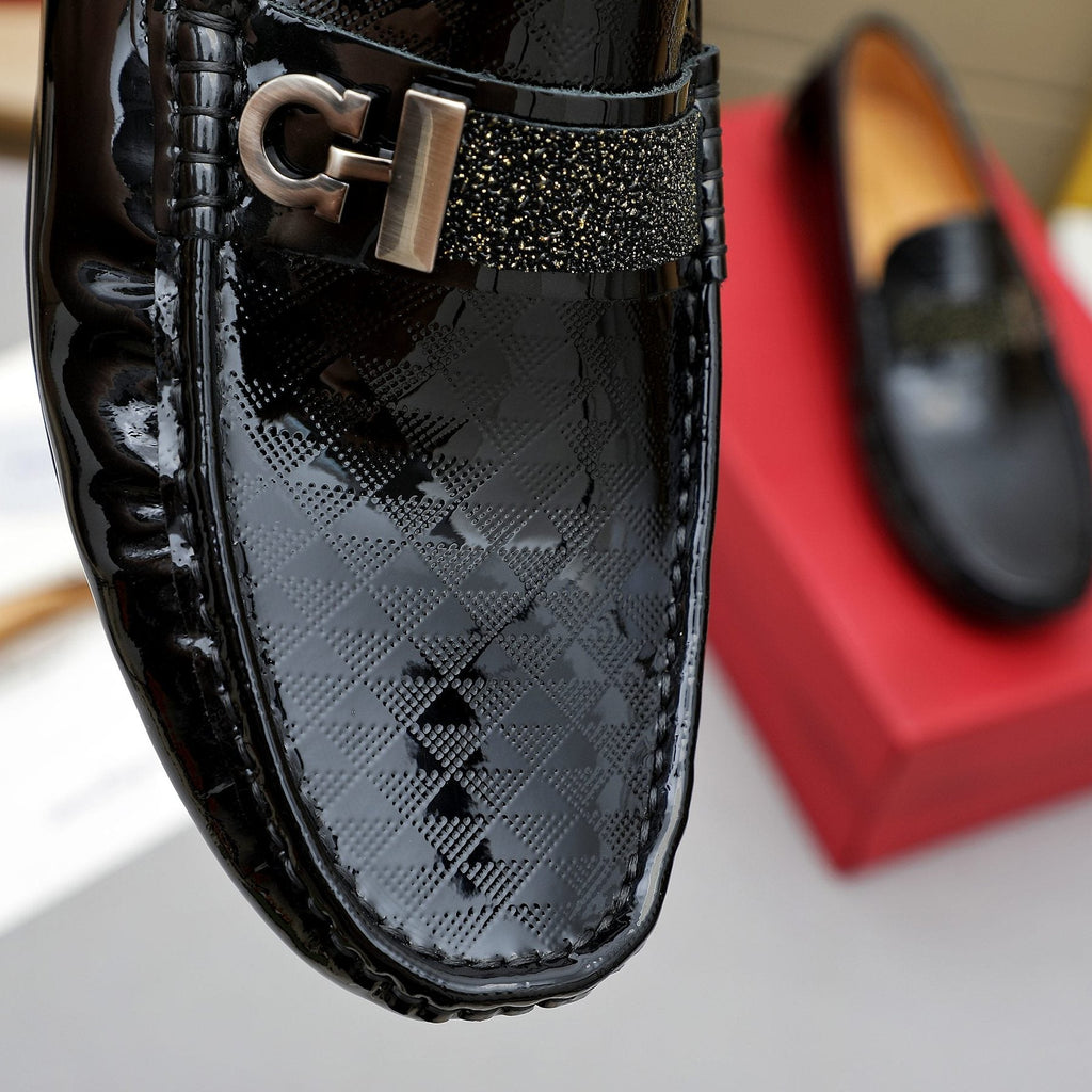 Ferragamo Black Embossed Slip-On Loafers — detail