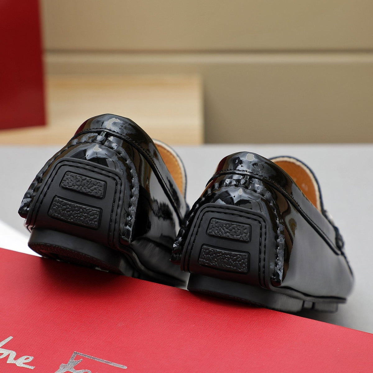 Ferragamo Black Embossed Slip-On Loafers — back