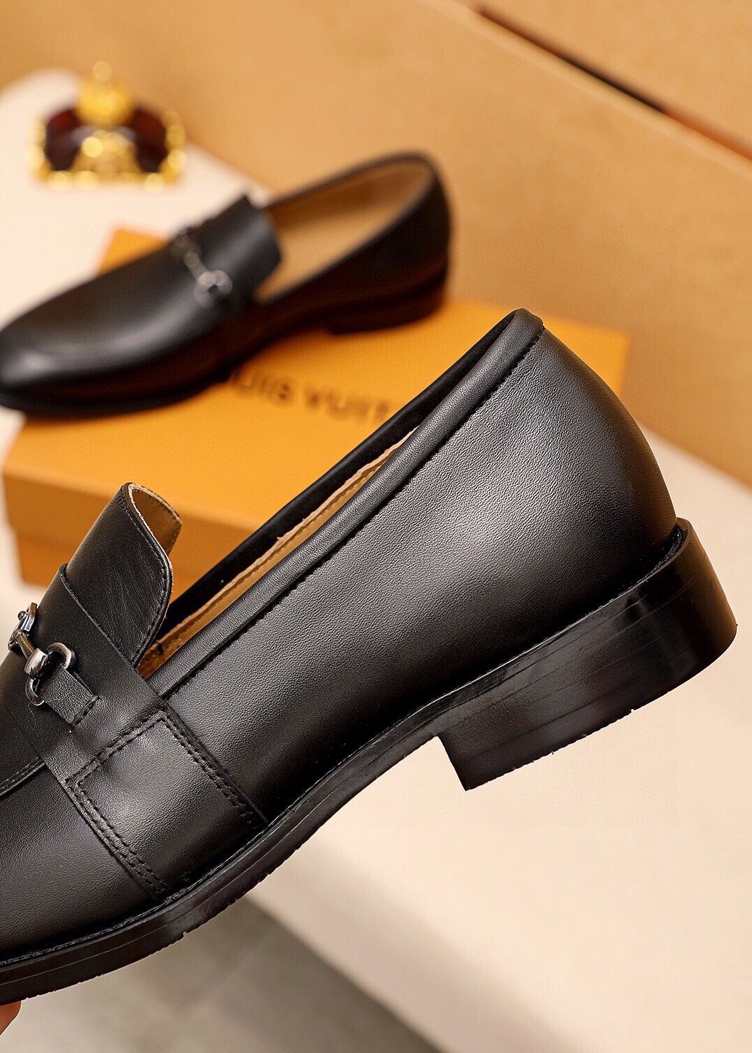 Louis Vuitton Black Metal-Bit Leather Loafers — detail