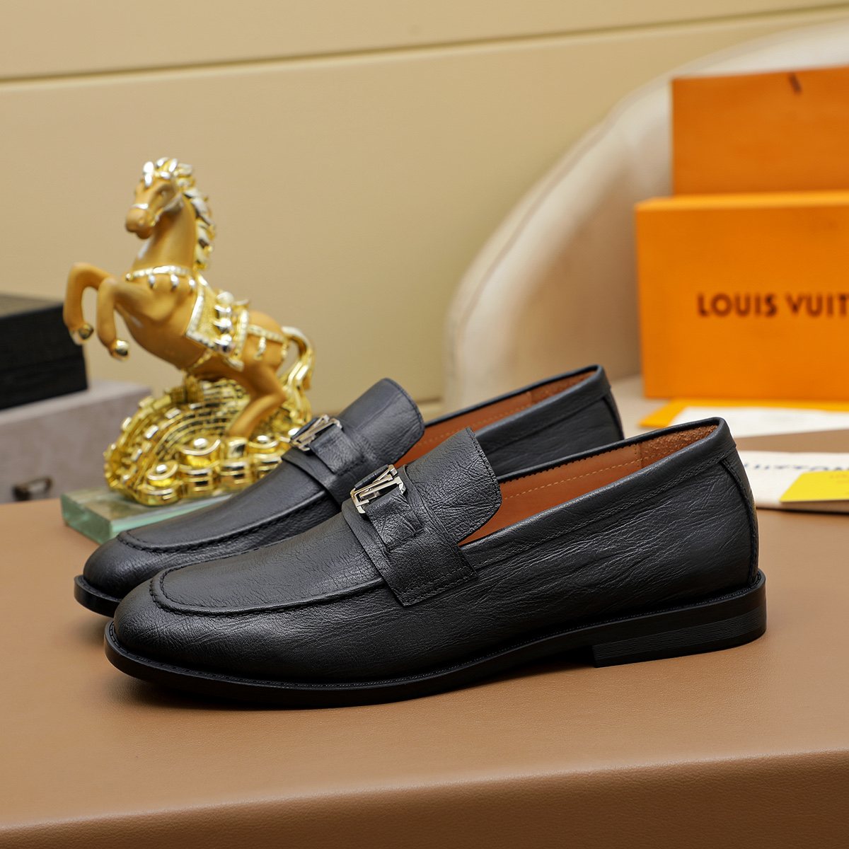 Louis Vuitton Black Textured Hardware Loafers — hero
