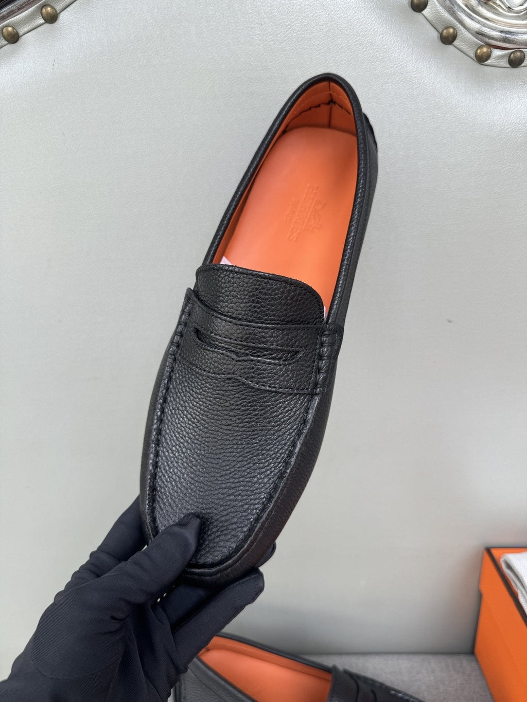 Hermès Black Textured Penny Loafers — front