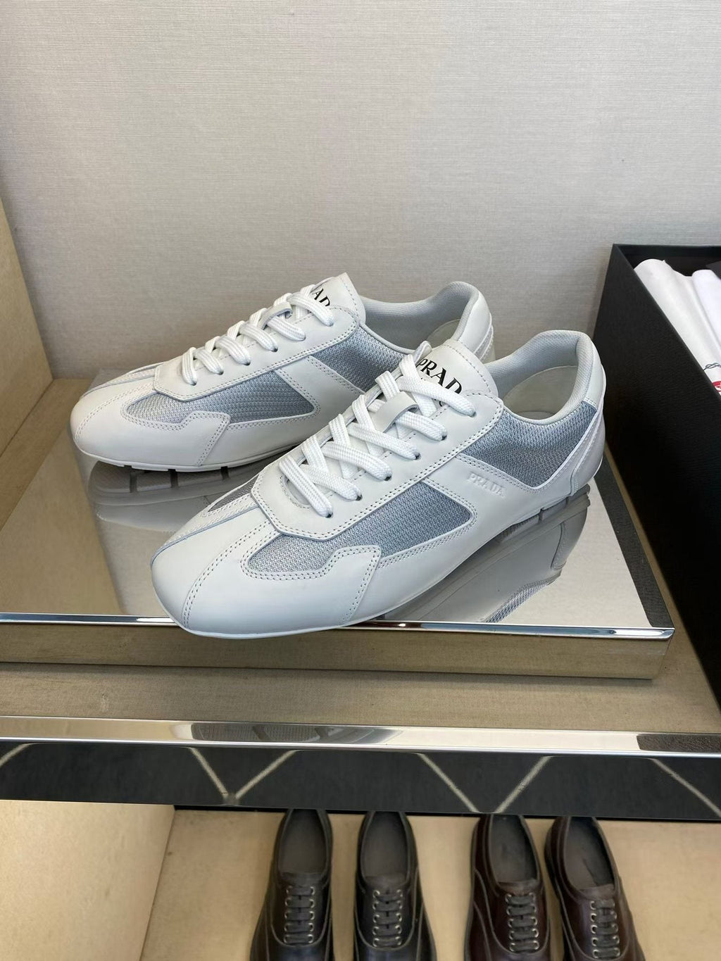 Prada White and Light Gray Low-Top Sneakers — front