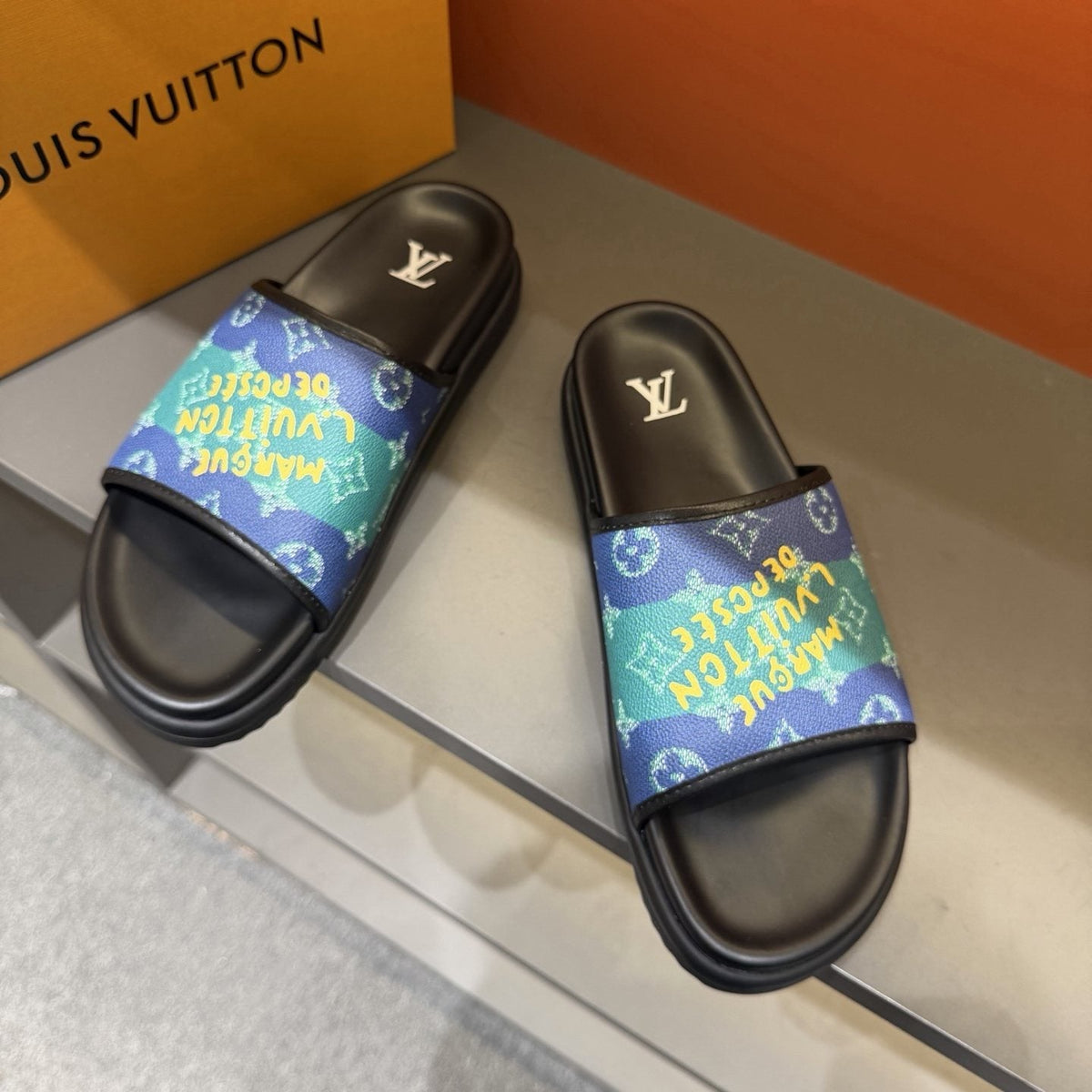 Louis Vuitton Blue Green Patterned Slide Sandals — front