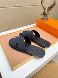 Hermès Black H-Strap Slide Sandals — hero