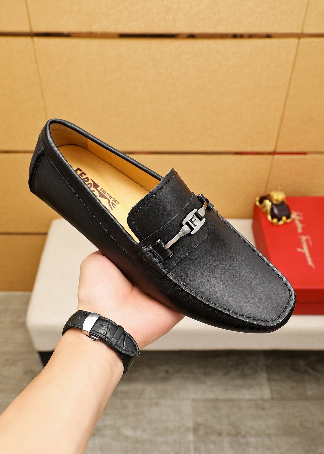 Ferragamo Black Metal-Trim Loafers — model