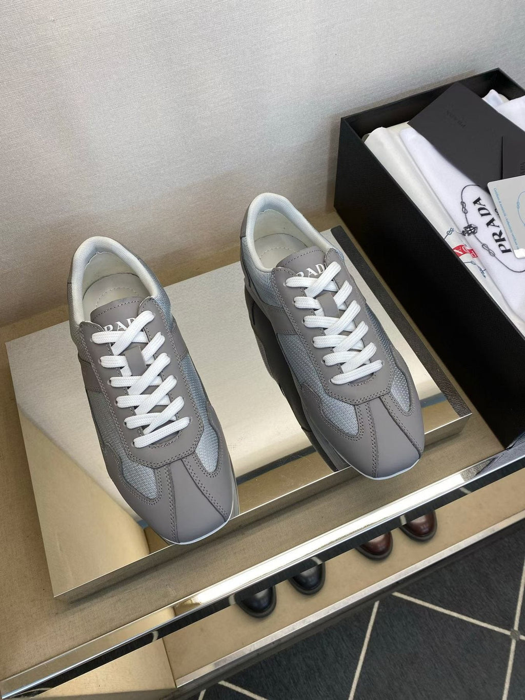 Prada Gray and White Low-Top Sneakers — front