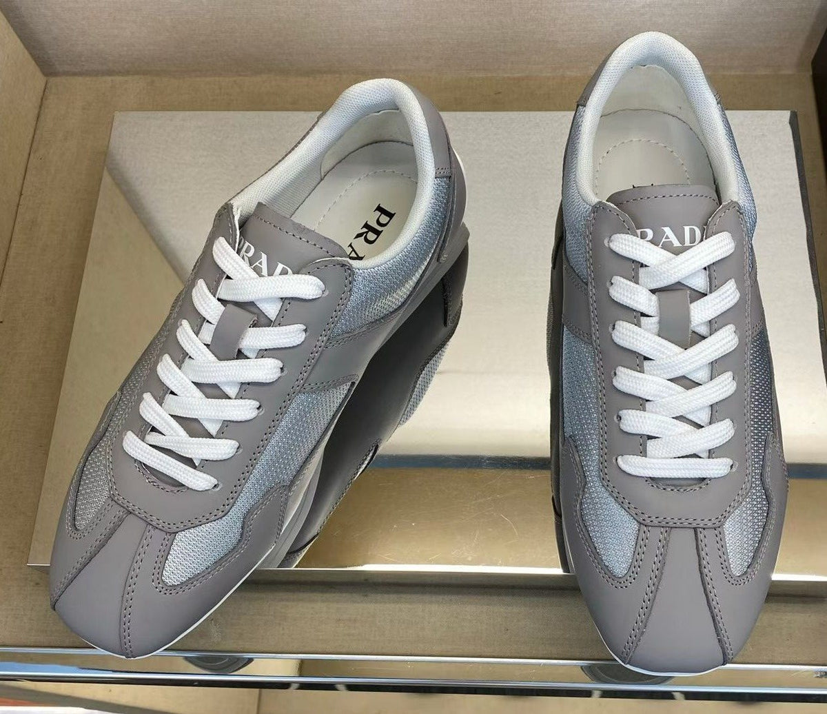 Prada Gray and White Low-Top Sneakers — front