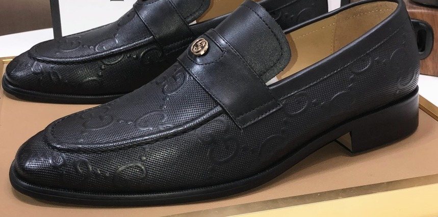 Gucci Black Embossed Leather Loafers — front