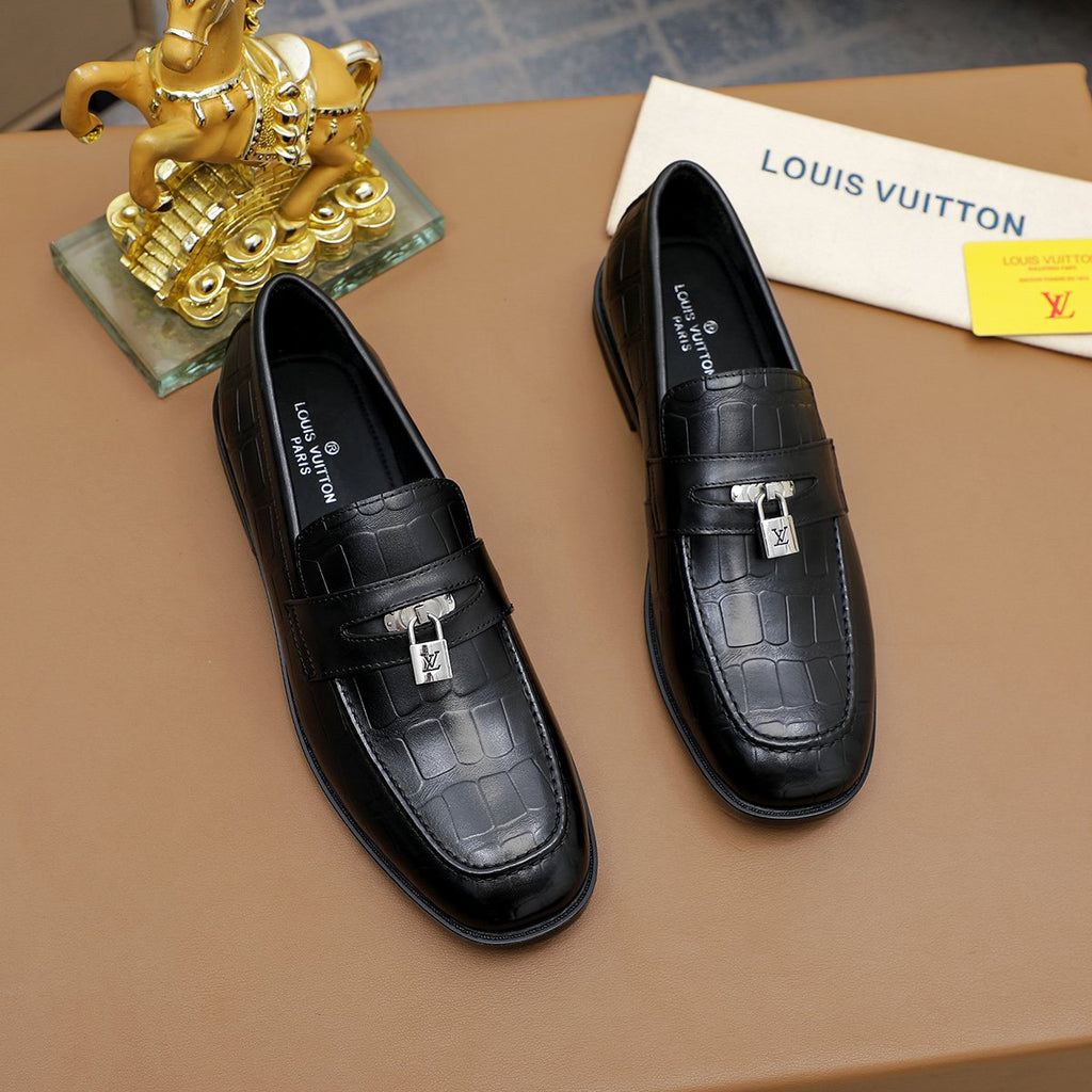 Louis Vuitton Embossed Bar Loafers — front