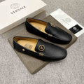 Versace Black Textured Slip-On Loafers — hero
