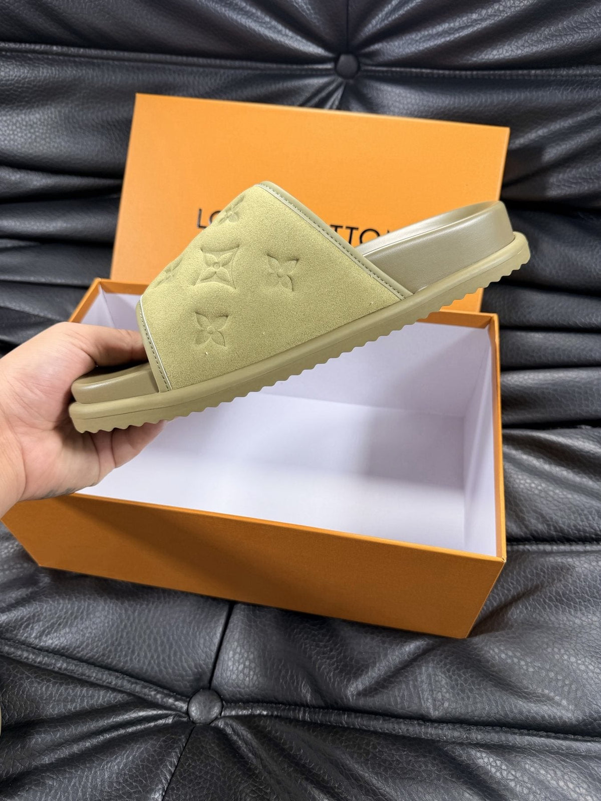 Louis Vuitton Embossed Slide Sandals — model