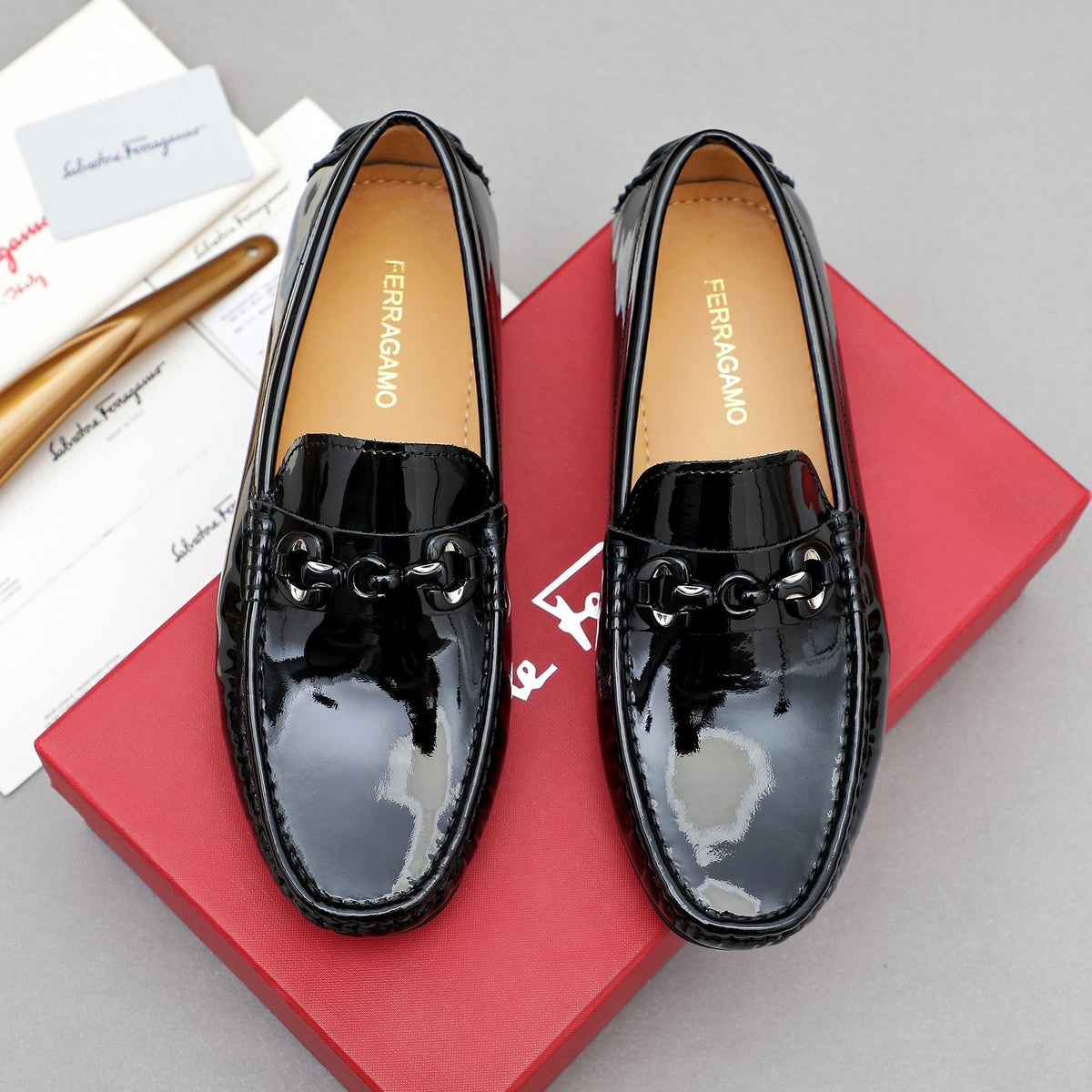 Ferragamo Black Metal Bit Loafers — hero