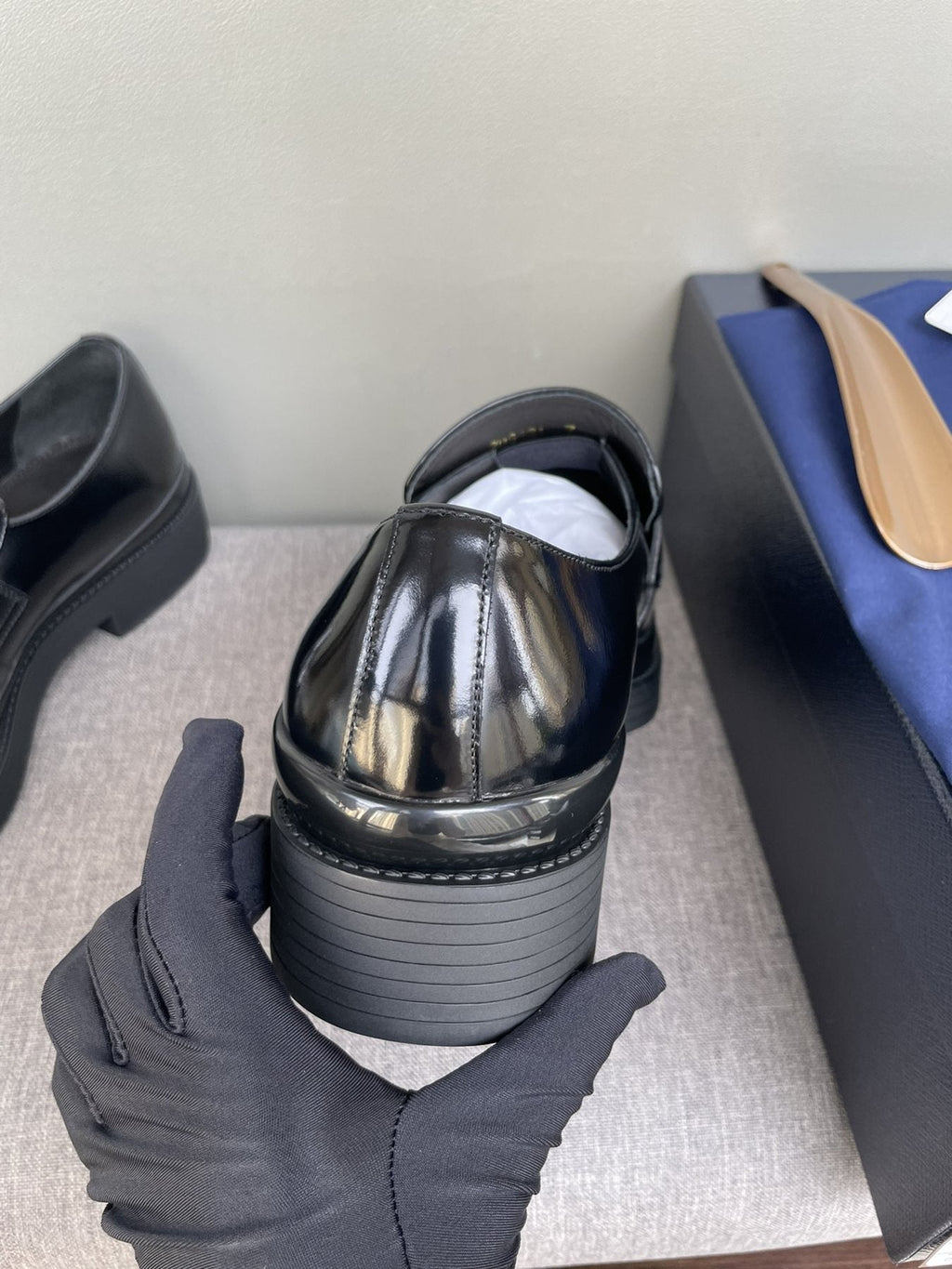 PRADA Black Glossy Plaque Loafers — detail
