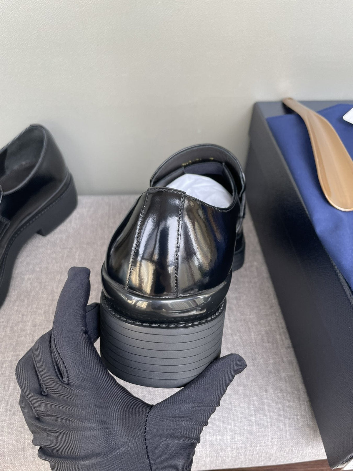 PRADA Black Glossy Plaque Loafers — detail