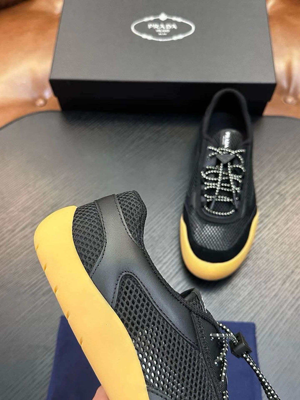Prada Black Sneakers with Yellow Sole — detail