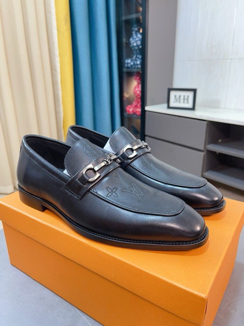 Louis Vuitton Black Metal-Bit Loafers — front