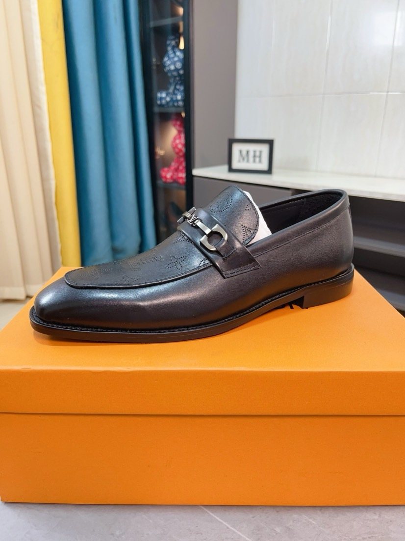 Louis Vuitton Black Metal-Bit Loafers — hero