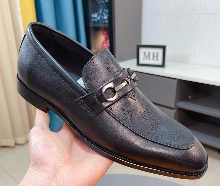 Louis Vuitton Black Metal-Bit Loafers — front